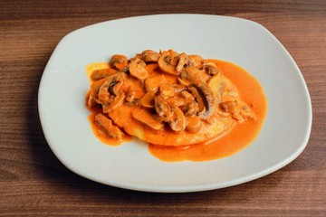 Champiñones en salsa