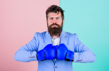 Developing winning strategy. Sport improves his leadership skills. Bearded man in boxing stance....