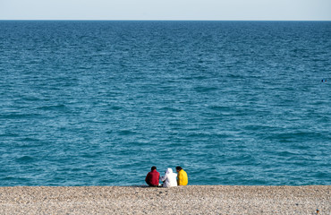 rede, white and yello on the beach