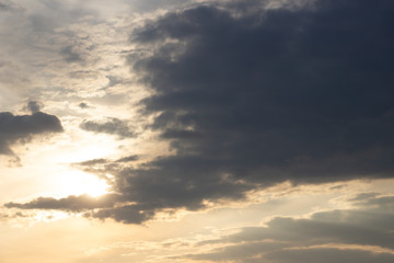 Beautiful sunset in the clouds, bright sun