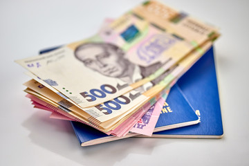 passports with national currency paper money close up view of cash