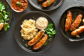 Grilled sausages with sauerkraut and horseradish