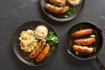 Grilled sausages with sauerkraut and horseradish