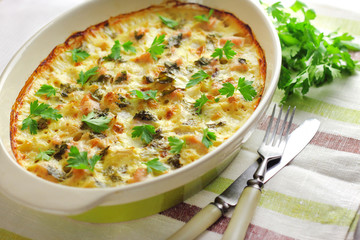 Chicken breast and cauliflower casserole in ceramic baking dish