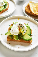 Poached eggs on toasted bread