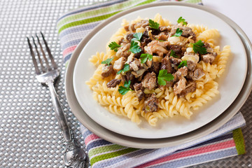 Spiral pasta with morel mushrooms