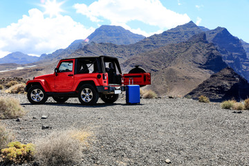 Summer car on road and sunset time in mountains.  © magdal3na