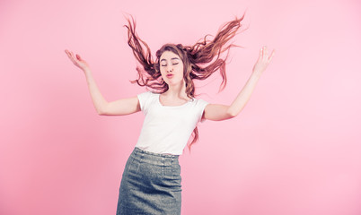 Portrait of a young girl on a colored background