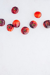 Tomatoes Mar Azul on white wooden table background