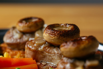 Close up of delicious food on wooden table.