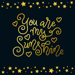 Modern calligraphy lettering of You are my sunshine in golden on dark background decorated with stars