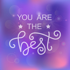 Modern calligraphy lettering of You are the best in white with stars on pink purple blue background