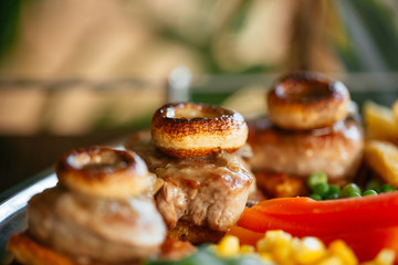 Close up of delicious food on brown table.