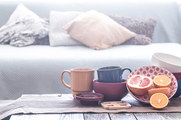 still life interior decor with home utensils on a wooden table