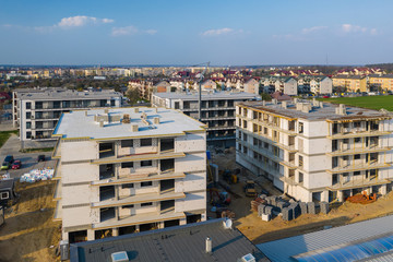 Multi-family building under construction, aerial view.