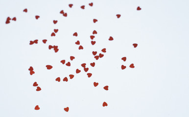 colored Sequin scattered on white background