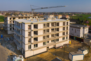 Multi-family building under construction, aerial view.