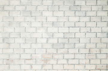 Old white bricks wall background or texture