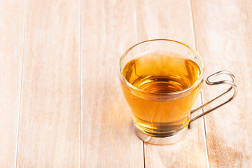 Tea with lemon verbena - Aloysia citrodora. Wood background