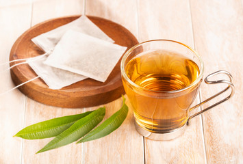 Tea with lemon verbena - Aloysia citrodora. Wood background