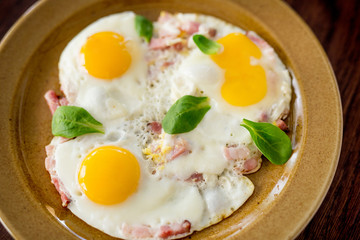 Scrambled eggs for breakfast from three eggs. Fried eggs.