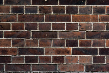 old dark brown brick wall texture pattern