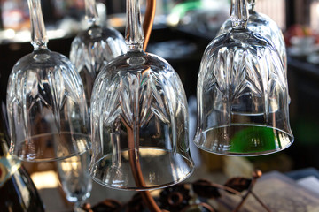 transparent wine glasses tulip wine champagne inlaid bottom of glass close-up background bar design