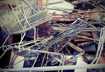 shopping cart in the landfill with old toned effect