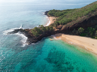 Isolated island with two beach with blue turquoise water with white sand beach. Aerial shot....