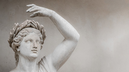 Statue of sensual Roman renaissance era woman in circlet of bay leaves, Potsdam, Germany, details, closeup