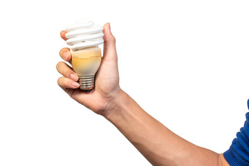 Energy save spiral twister light bulb or spiral tube fluorescent lamp isolated on white background. Hand holding old and used compact fluorescent lamp for energy saving.