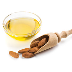 Almond oil in bowl on white