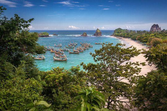 Fishing Boats anchored at the Beach, Papuma, East Java, Indonesia