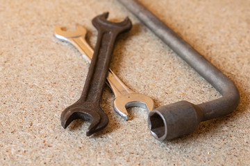tools for repairing machine are scattered on the floor of the plant, the hex key wrench hand tools