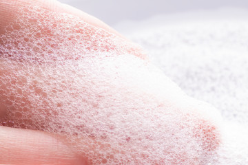 Foam on hand with bubbles