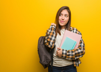 Young student woman thinking about an idea