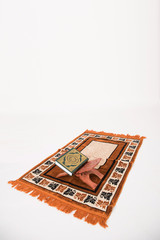 The holy Koran on praying carpet