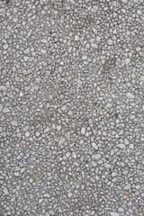 White stones in concrete