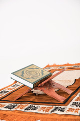 The holy Koran on praying carpet