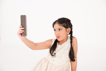 Female child using smart phone