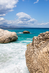 secret beach between rocks, turquoise blue caribic water