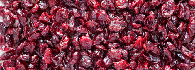 Dry organic cranberries, top view. Overhead, flat lay. Close-up.
