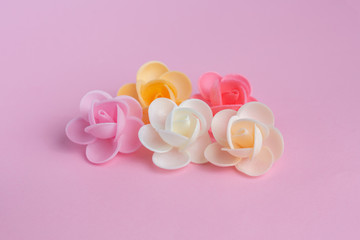 Waffle flowers on a pink background. Confectionery decor. The large plan. Macro.