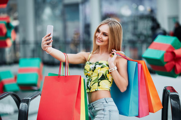 Cute girl posing at shopping mall