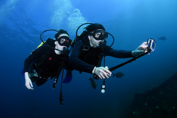 Diving and snorkeling in Bali.  Newlyweds, wedding, just married