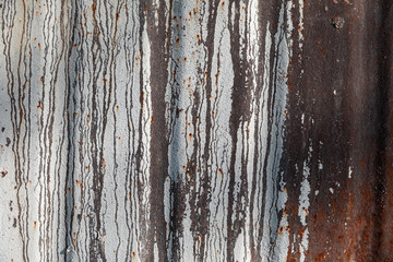 Old paint on rusty wall