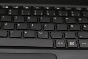 Laptop keyboard, black keyboard. Keyboard close up