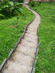 Fototapeta premium Stone staircase surrounded by greenery. Koh Phangan Thailand