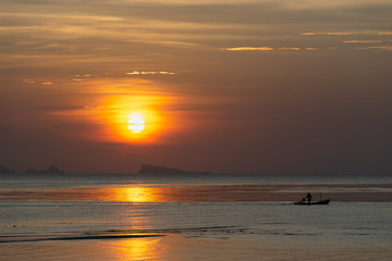 Obraz premium Fiery Orange Beach Sunset