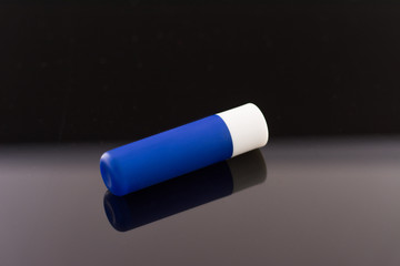 chat stick blue tube isolated on black background